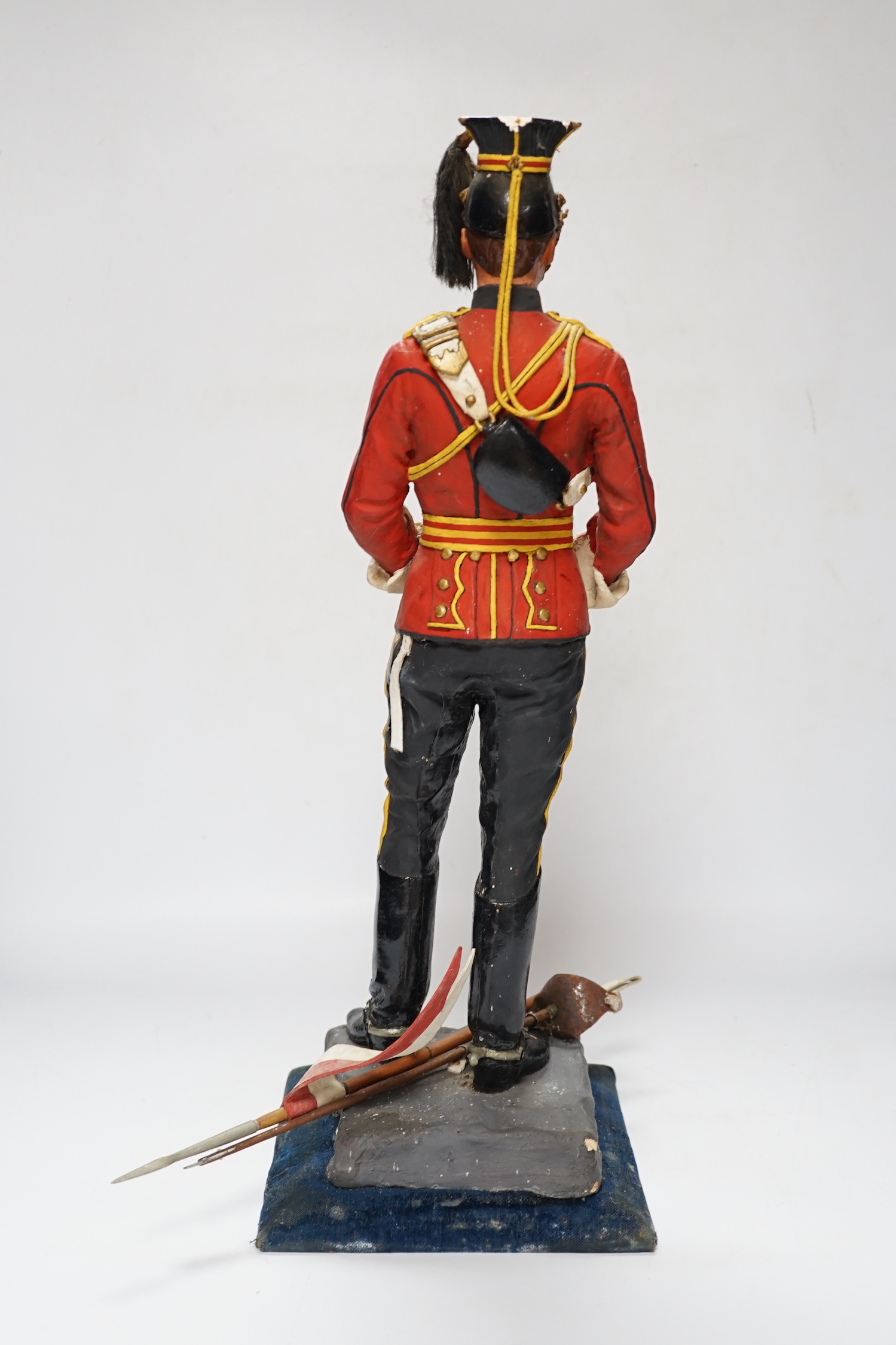 A painted plaster figure of a lancer, 48cm